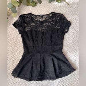 Black lace peplum top. M